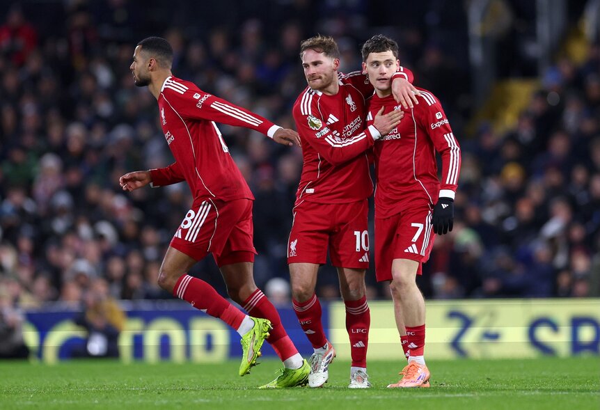 Florian Wirtz of Liverpool celebrates scoring his team's first goal with teammates Alexis Mac Allister and Cody Gakpo.