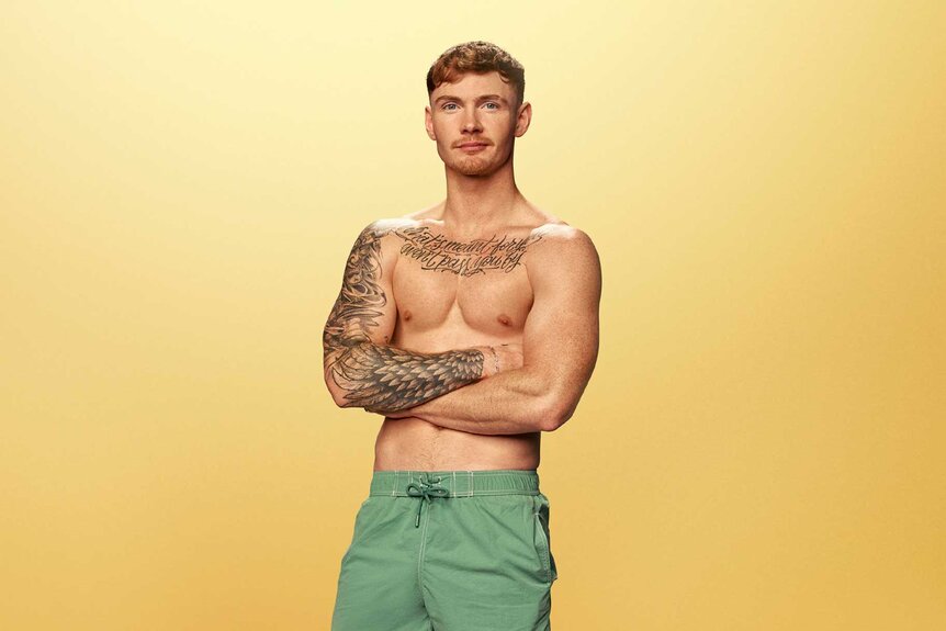 Jack smiling in swim shorts for Love Island: All Stars Season 3.