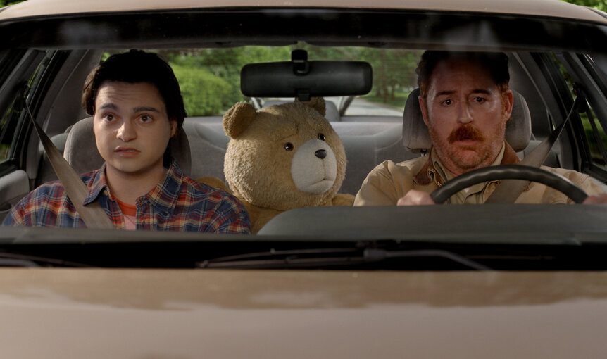 John (Max Burkholder), Ted (Seth MacFarlane), Matty (Scott Grimes) driving a car in Ted season 2.