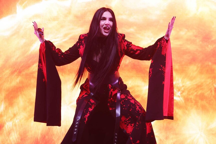 Tamara Živković singing in a red dress during the London Eurovision Party 2026.