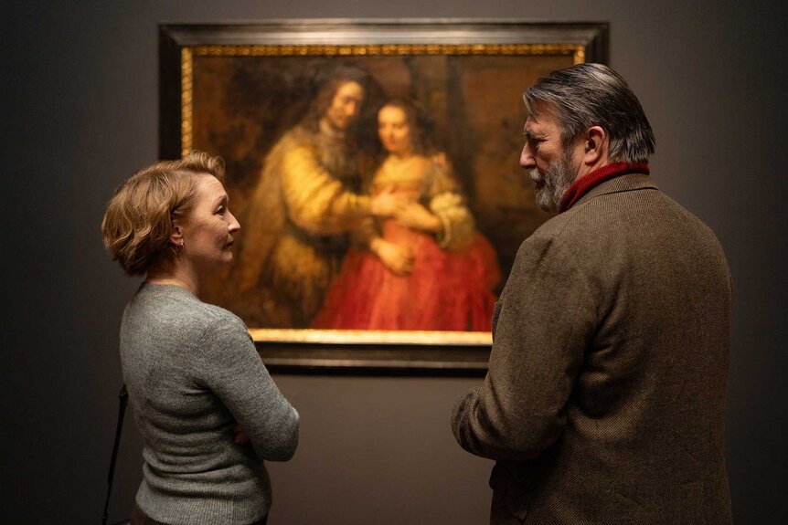 Stella and Gerry look at each other in Midwinter Break (2026).
