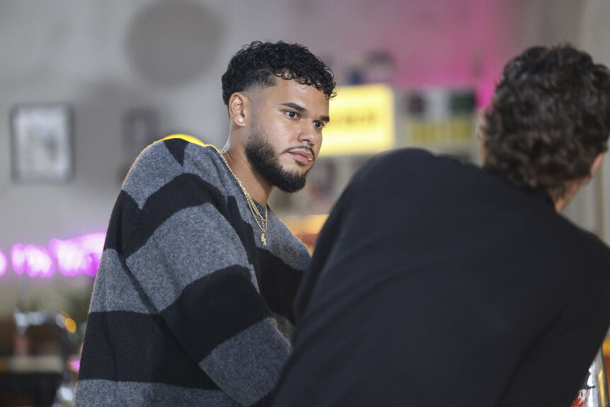 Bryan Arenales talking to TJ Palma in Love Island: Beyond the Villa Season 2.