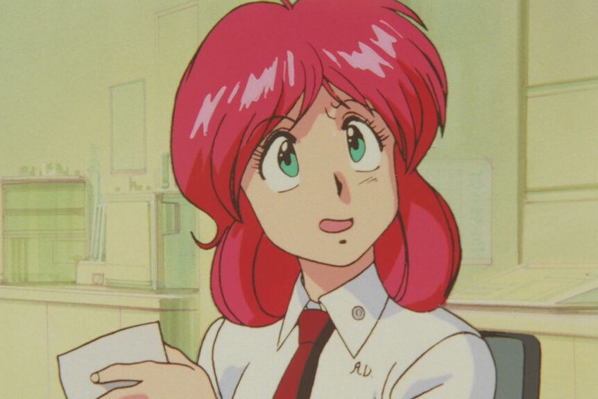 Animation of a woman with red hair in Bubblegum Crisis.